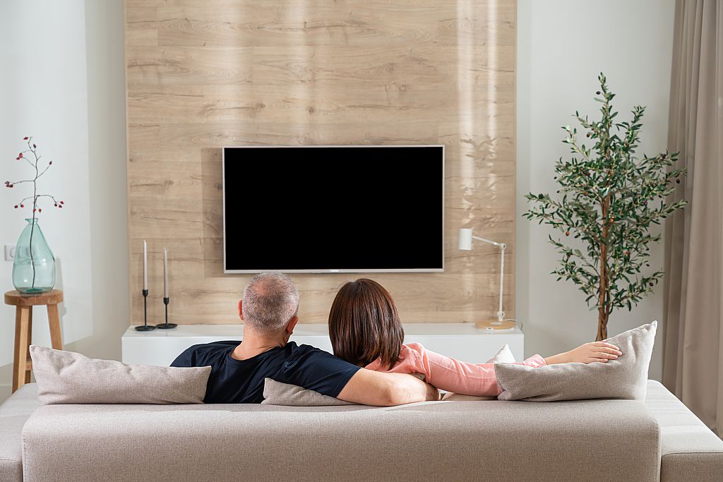 It's important to hang your TV at the right height for comfortable viewing. Read on for more TV wall ideas.