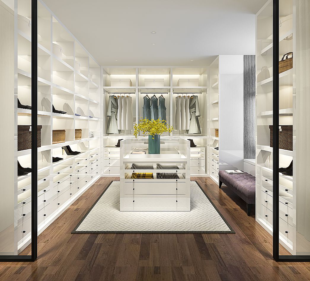 If you have the space, put a chaise lounge in the center of your closet or add a bench at the side.
